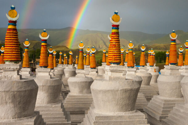 rainbow and stupas in Tibet
