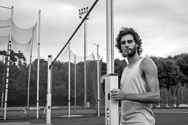 Gianmarco Tamberi at athletic track posing for Susi Belianska