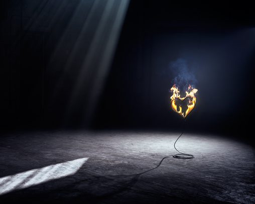 a heart shaped wire on fire