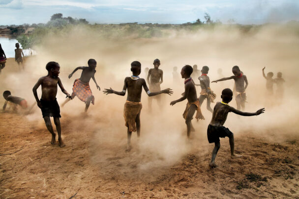 children playing in dust