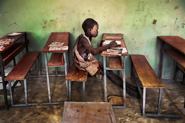 A child studies in a classroom
