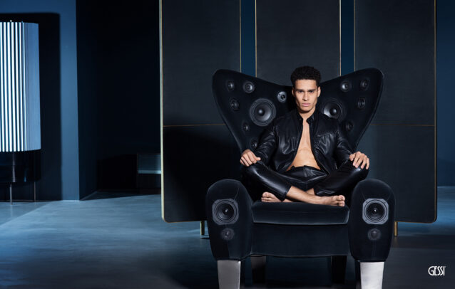 a man on an armchair with speakers for Gessi by Susi Belianska