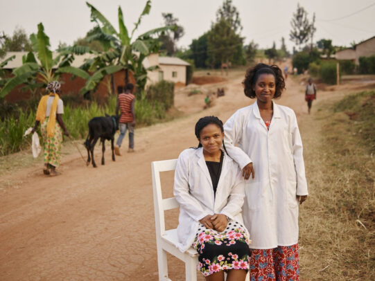 two doctors next to each other in an ethiopian street for Novartis annual report by Joey L.