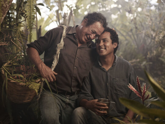 Father hugging his son in the middle of a coffee plantationfor Lavazza Calendar 2016 by Joey L