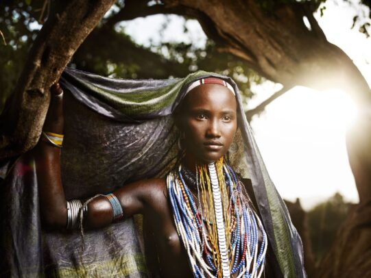 ethiopian girl with traditional dress in the Omo Valley by Joey L. 