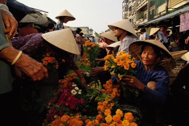 women selling and buying flowers in Vietnam