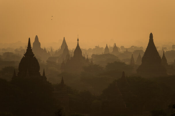 Temple spires silhouetted in Bagan
