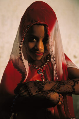 Young muslim girl in the traditional buibui