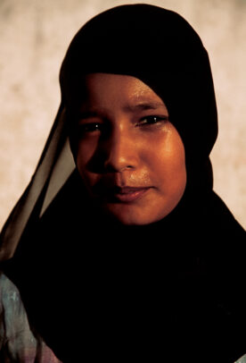 Young muslim girl in the traditional buibui
